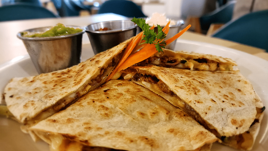 Cheesy quesadilla paired with salsa and guacamole - Hotel 39, Jamaica