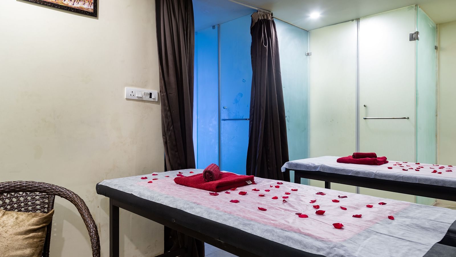 Image of room with two beds decorated with flower petals at Calux Grand Baga.