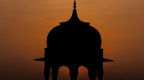 the silhouette of a minaret