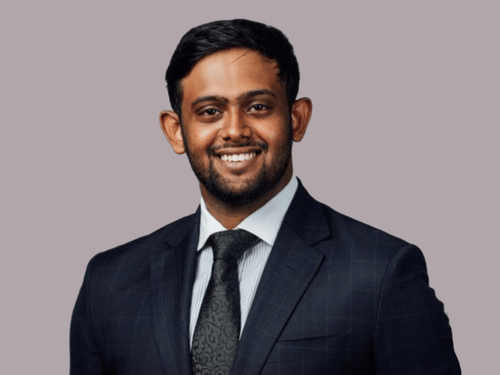 Vignesh Nair, Director at UDS Group of Hotels in grey background