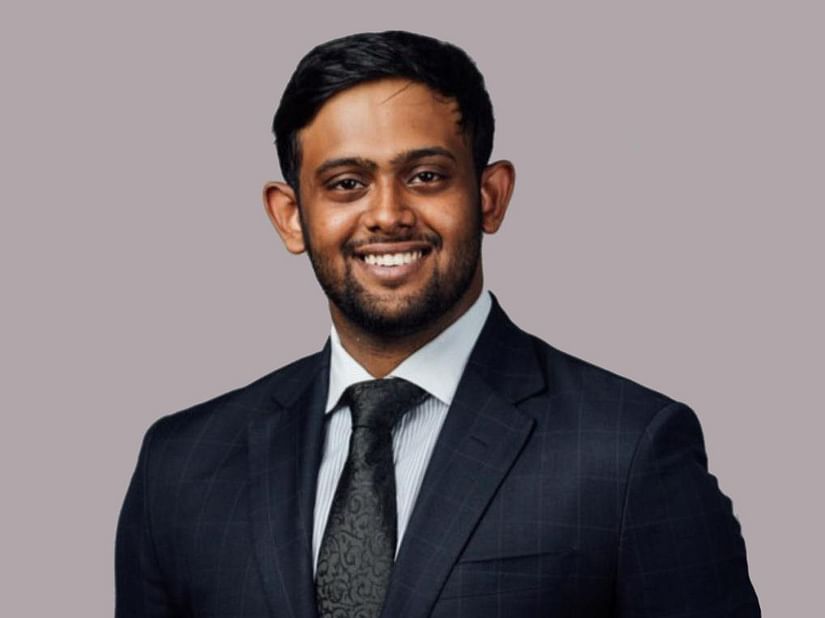 Vignesh Nair, Director at UDS Group of Hotels in grey background