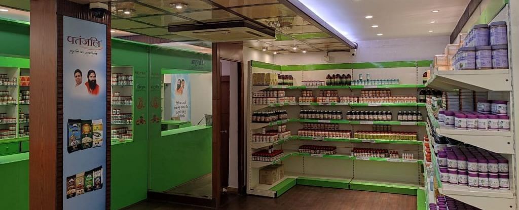 A brightly lit interior space, perhaps a shop or display area at Vedikant Resorts The Mallard Corbett, shows various items.