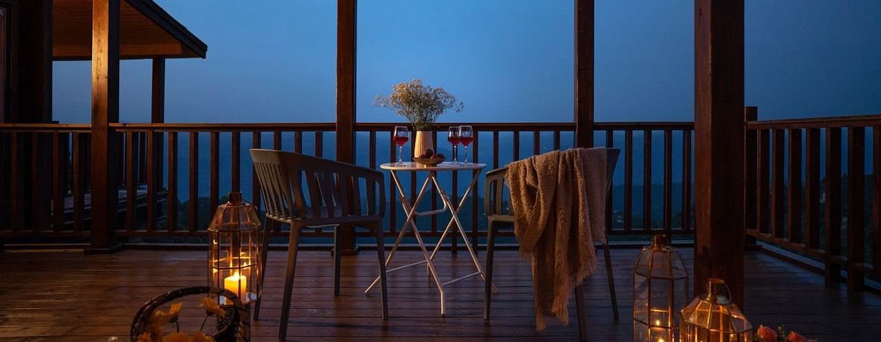 An image of a a seating setup on a patio at avalon cottages | Avalon Cottages, Kanatal