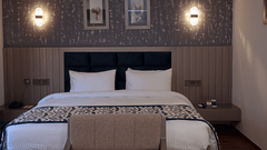 A front view of the bedroom with cosy king size bed at Grand Continent, Anjuna - A Sarovar Portico Affiliate Hotel  