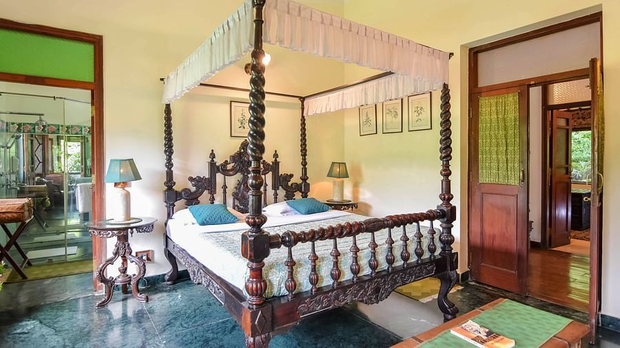 Image of interior of a Hotel Room with bed at Shaheen Bagh Resort Dehradun