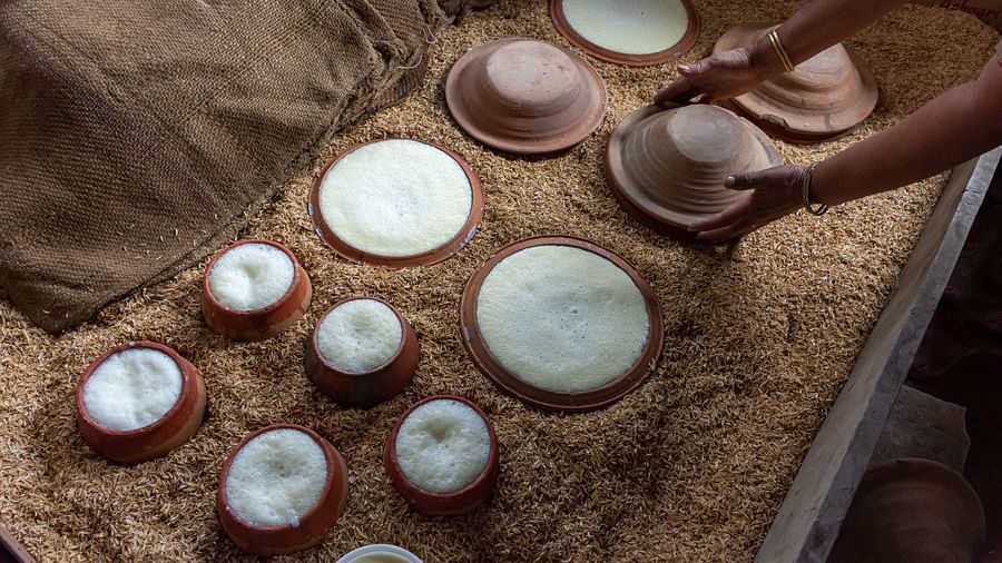 A person preparing a culinary delight