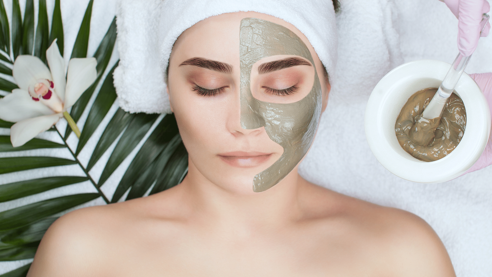 Image of a woman with half of her face covered with a facial mask - Best Facial in Guwahati