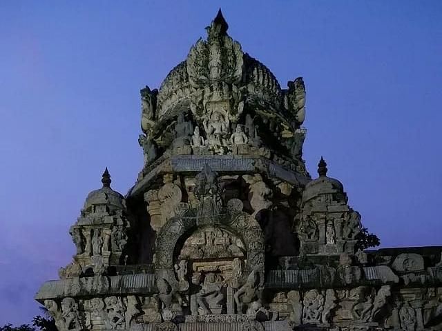 Ancient stone temple with intricate carvings at Dharasuram, showcasing its architectural beauty