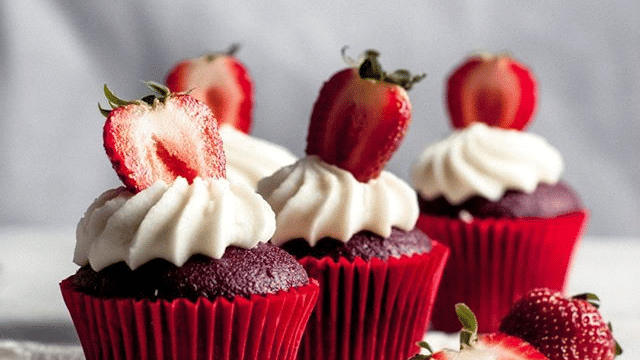 3 strawberry cupcakes kept side by side