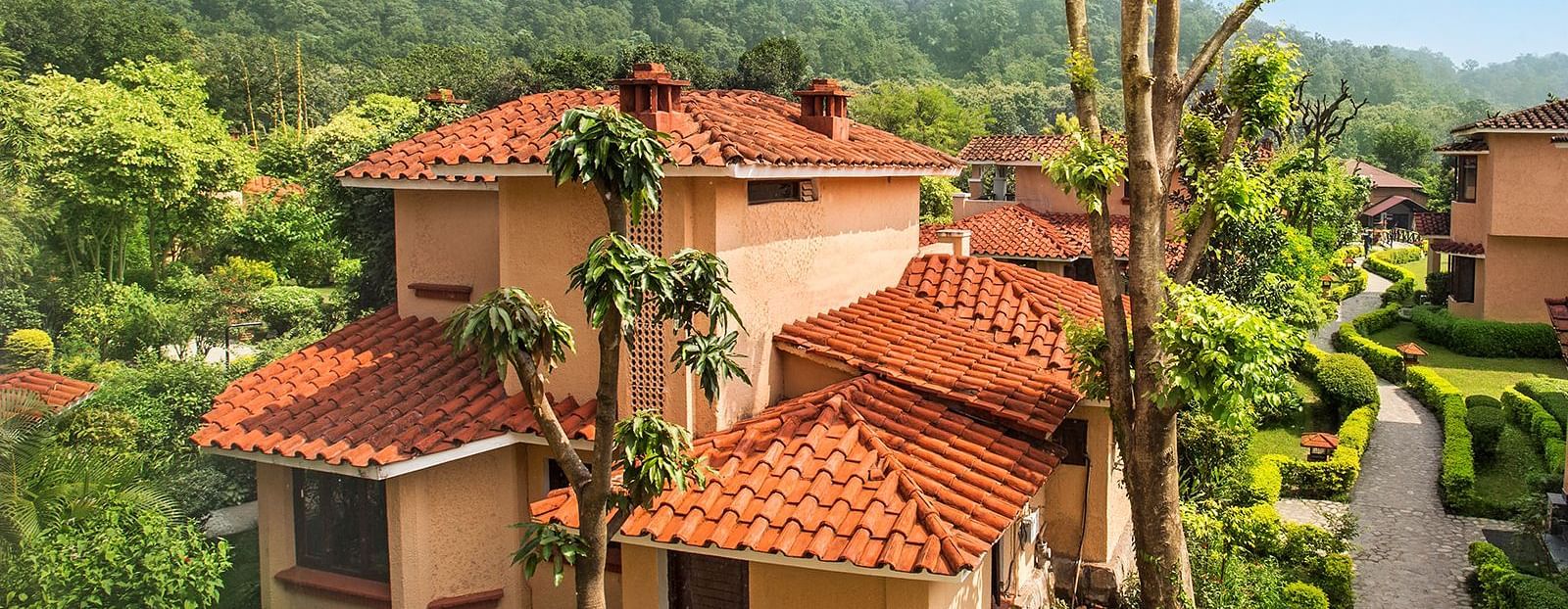 Aerial view of the resort surrounded by lush greenery.