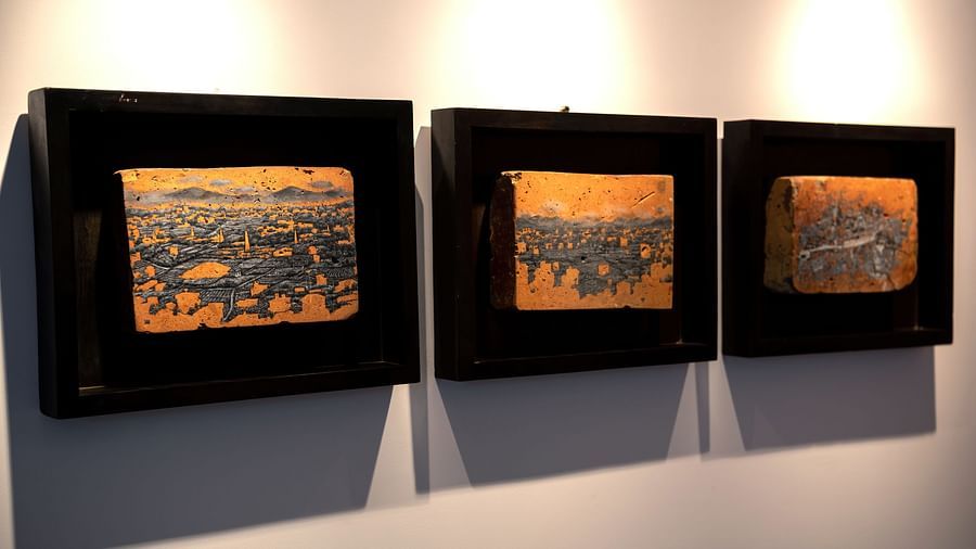 Three pieces of the artwork of the Sky garden hung on the wall - The Nanee