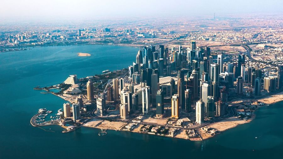 Aerial view of Doha's coastline surrounded by water - La Maison Hotel, Doha