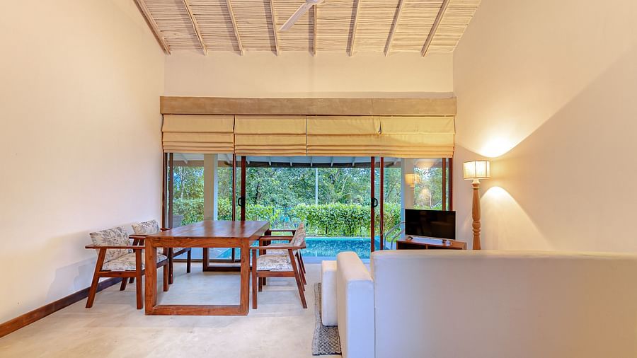 Open-plan living and dining space with modern furniture