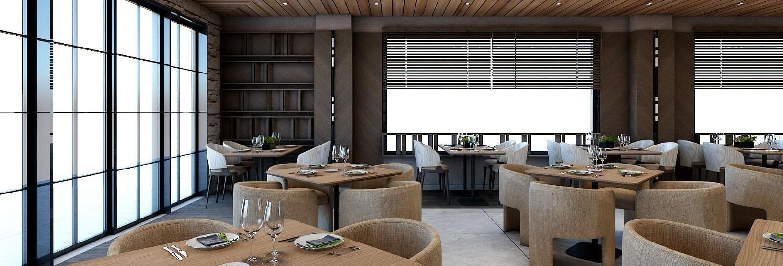 Dining tables placed besides the huge windows emitting plenty of natural light from outside - Namaste Corbett 