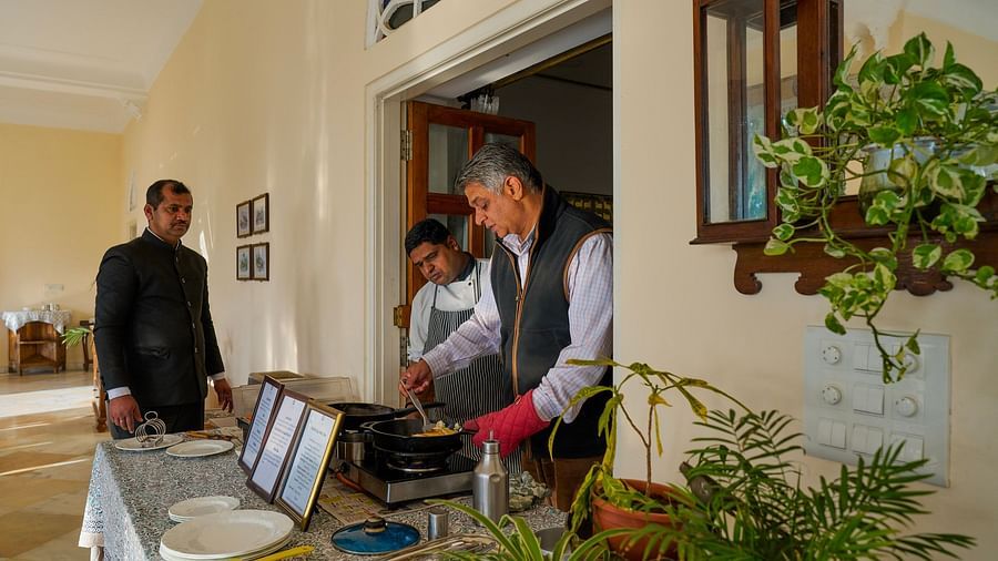 image of the staff at dev shree, deogarh arranging the table