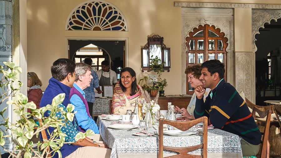 image of a group of guests enjoying a sumptuous dining at dev shree, deogarh