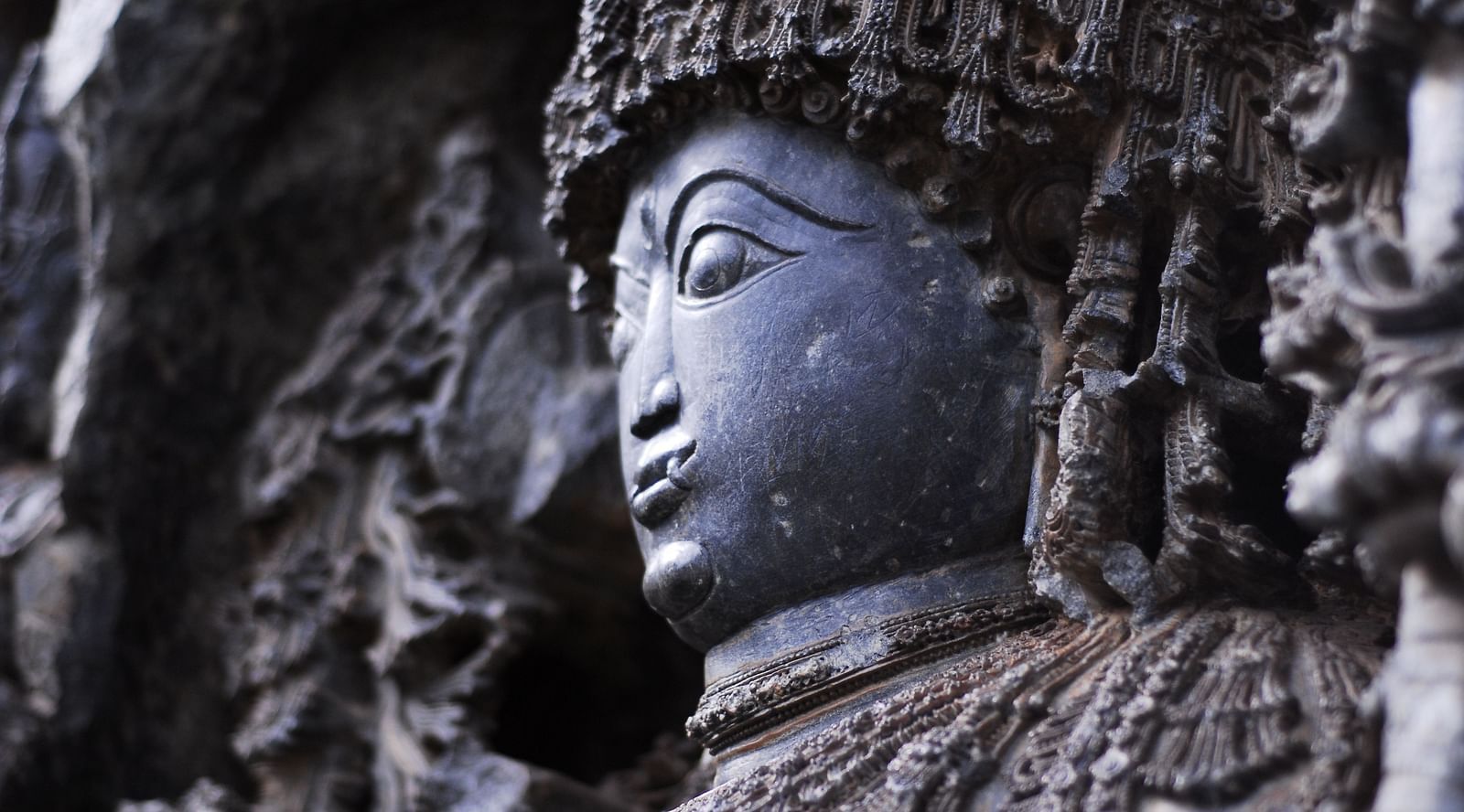 a sculpture of a deity at a temple 