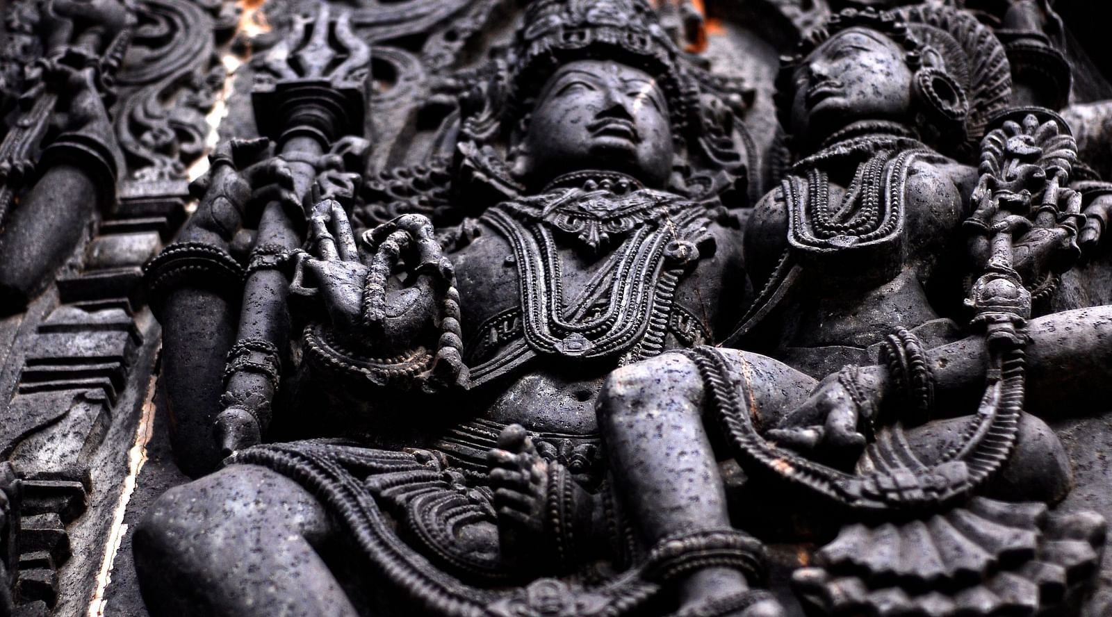 a sculpture of a deity at a temple 