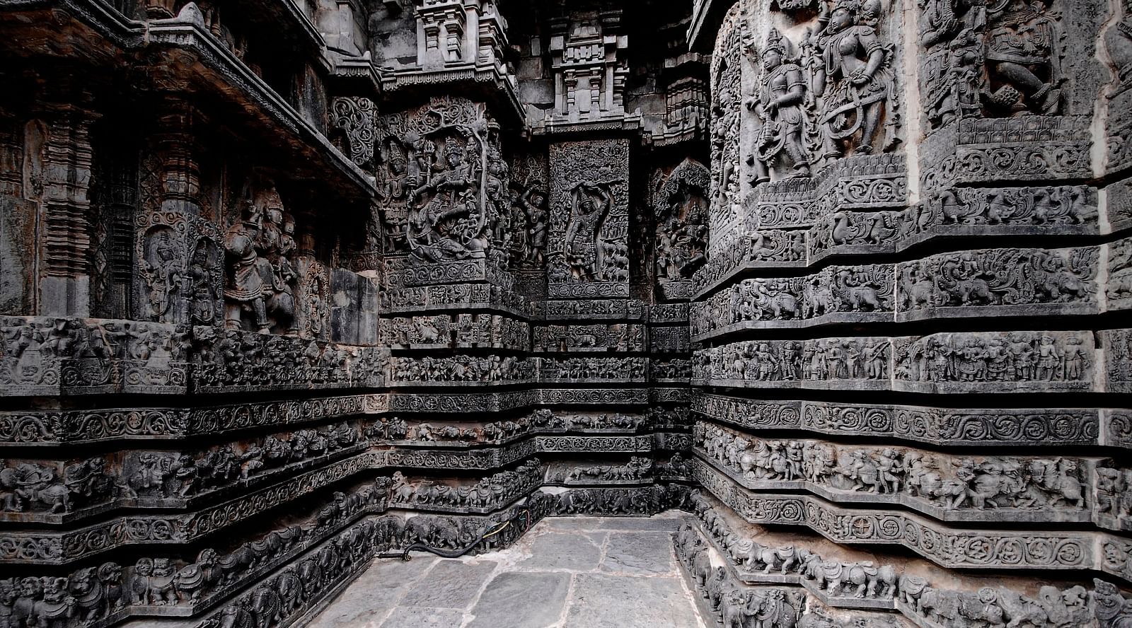 carvings on the stone walls at a temple