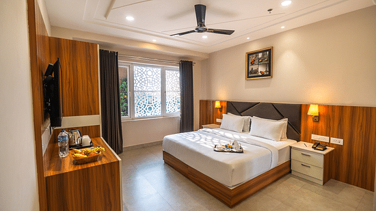 Suite room bed with view outside window