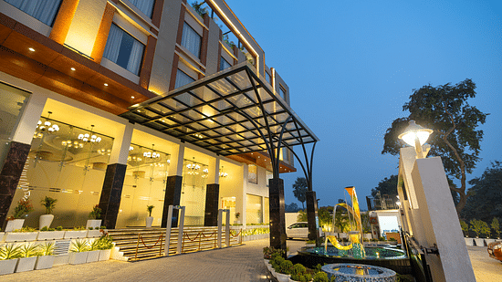 Semi-facade of Clarks Inn Express in Ayodhya featuring its entrance and porch