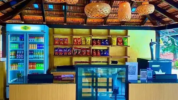 A wooden counter in Aqua Vida Restaurant at Indie Stays Resort, Goa.