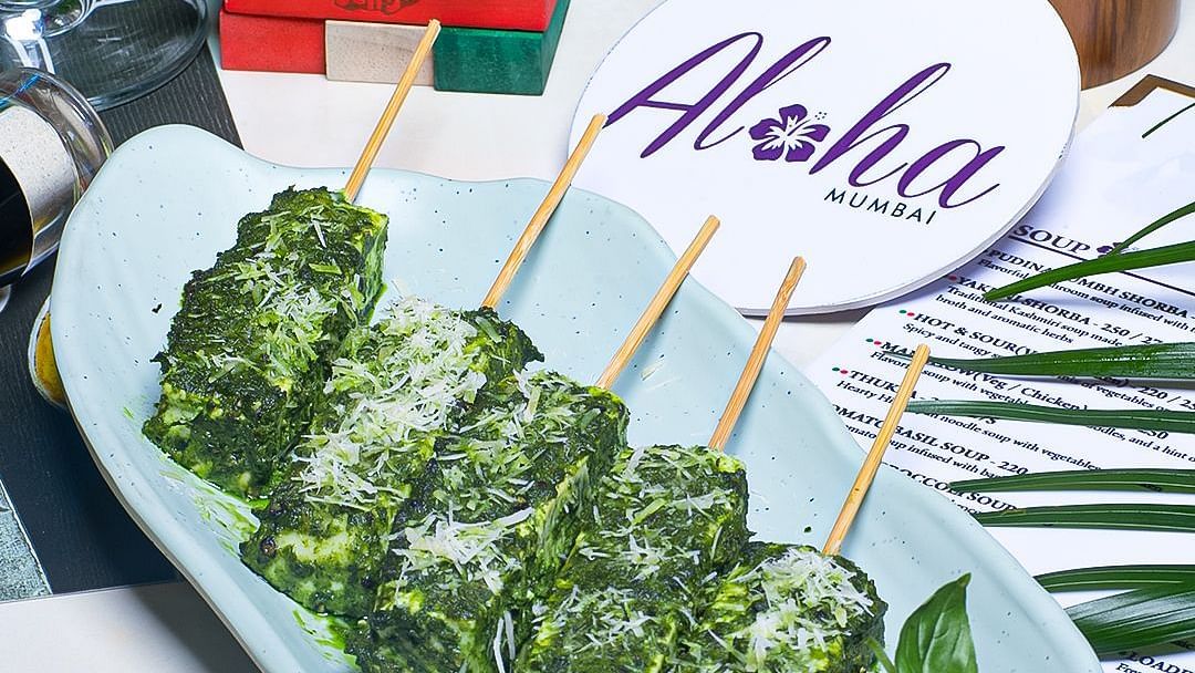 Herb marinated paneer skewers with salad garnish served at Hotel Mumbai House Mindspace, Malad.