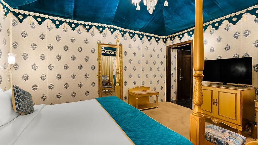 An overview of a tent with a close up shot of a double bed - Rajasthali Resort & Spa, Jaipur.