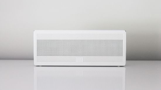 white air-conditioner placed against white wall