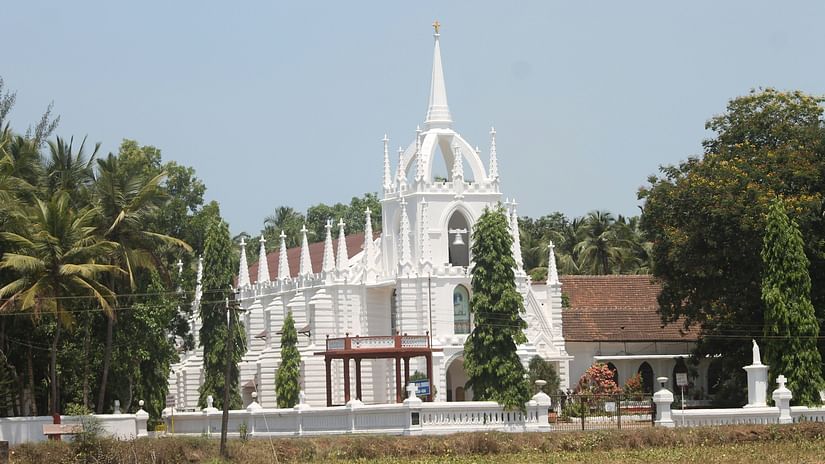 image of A Church in Goa surrounded by trees and greenery