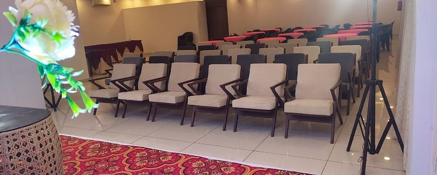 Image of a conference hall with chairs and lights on the ceiling at Vagator Downtown, Goa