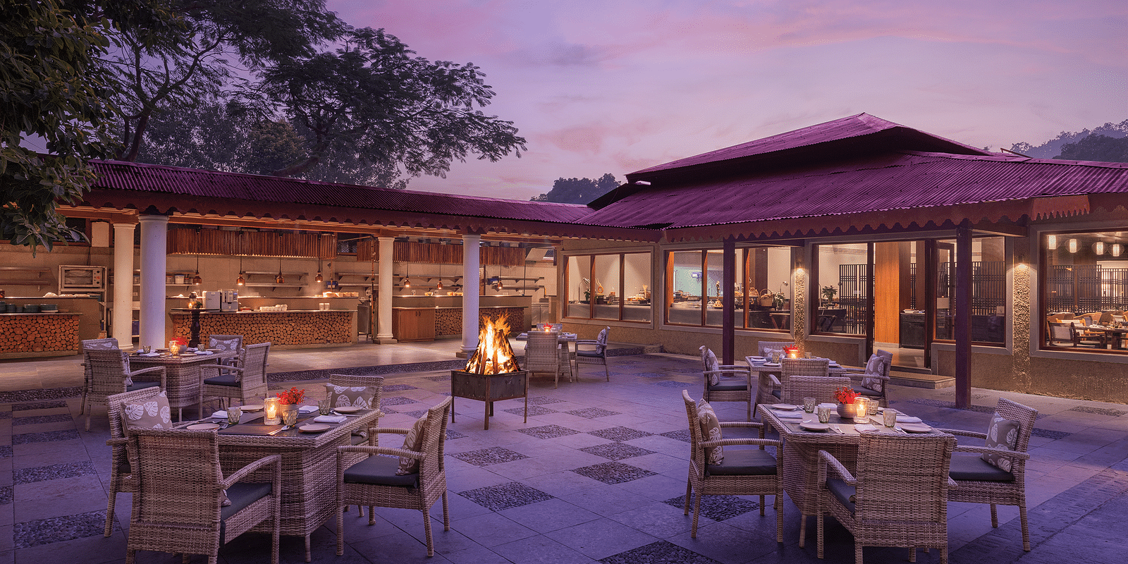 An image of an outdoor seating area with table and chairs near the villa -The Riverview Retreat,  Corbett