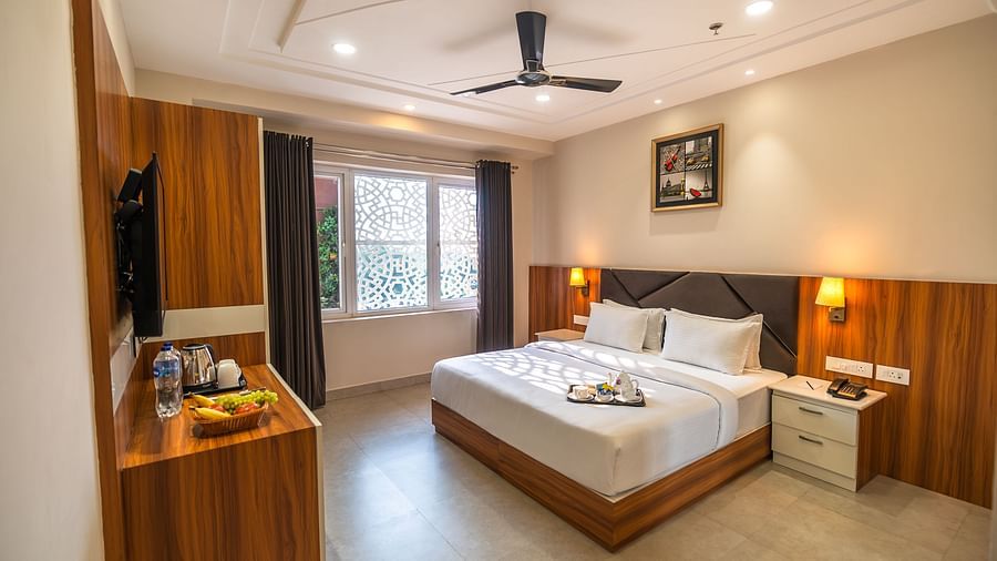 Suite room bed with view outside window