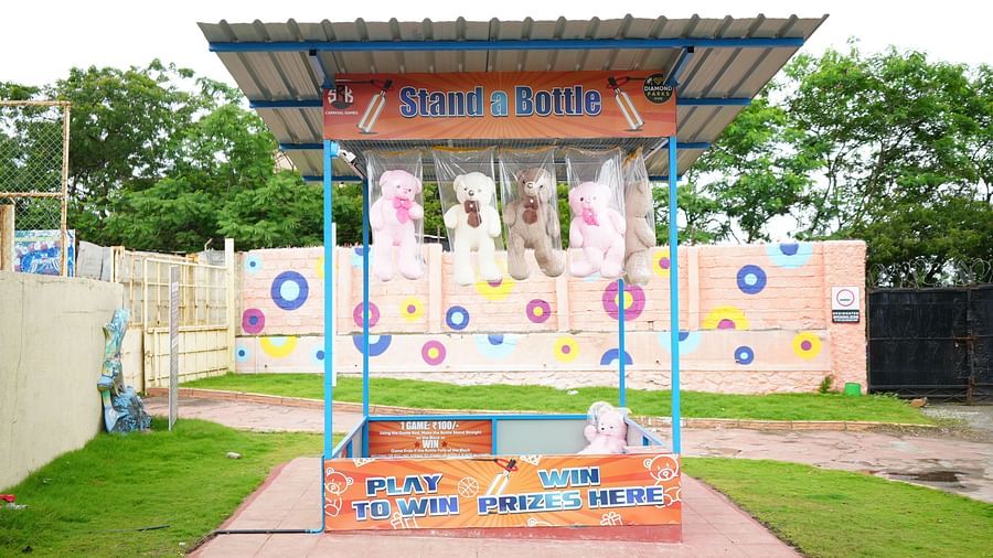 A box where teddy bears are hanged which can be obtained by winning games  | Diamond Parks, Pune