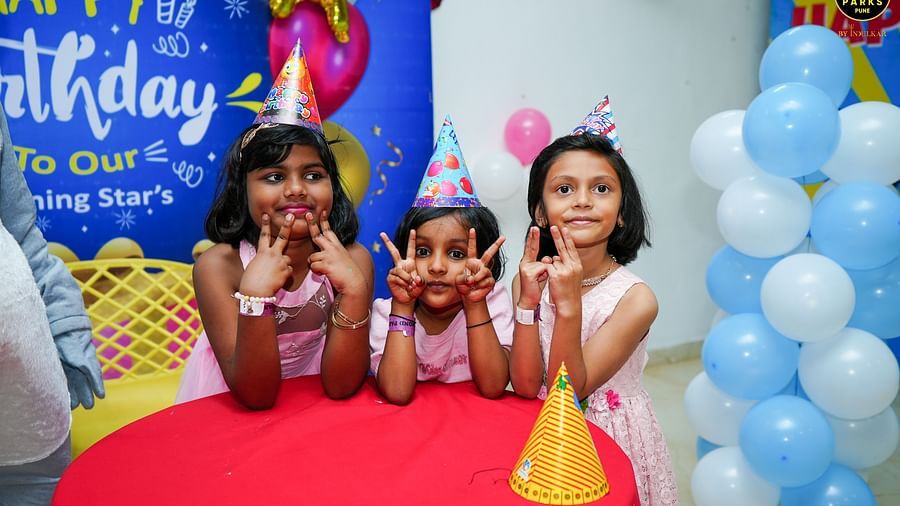 Small children posing for a picture during a birthday party - Diamond Parks, Pune 
