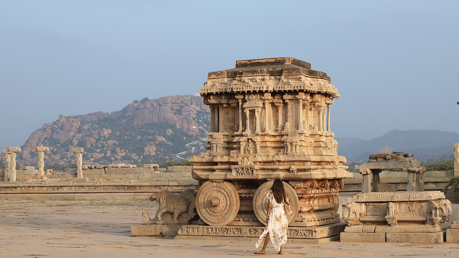 Iconic stone chariot at Vittala Temple ruins near Evolve Back Hampi