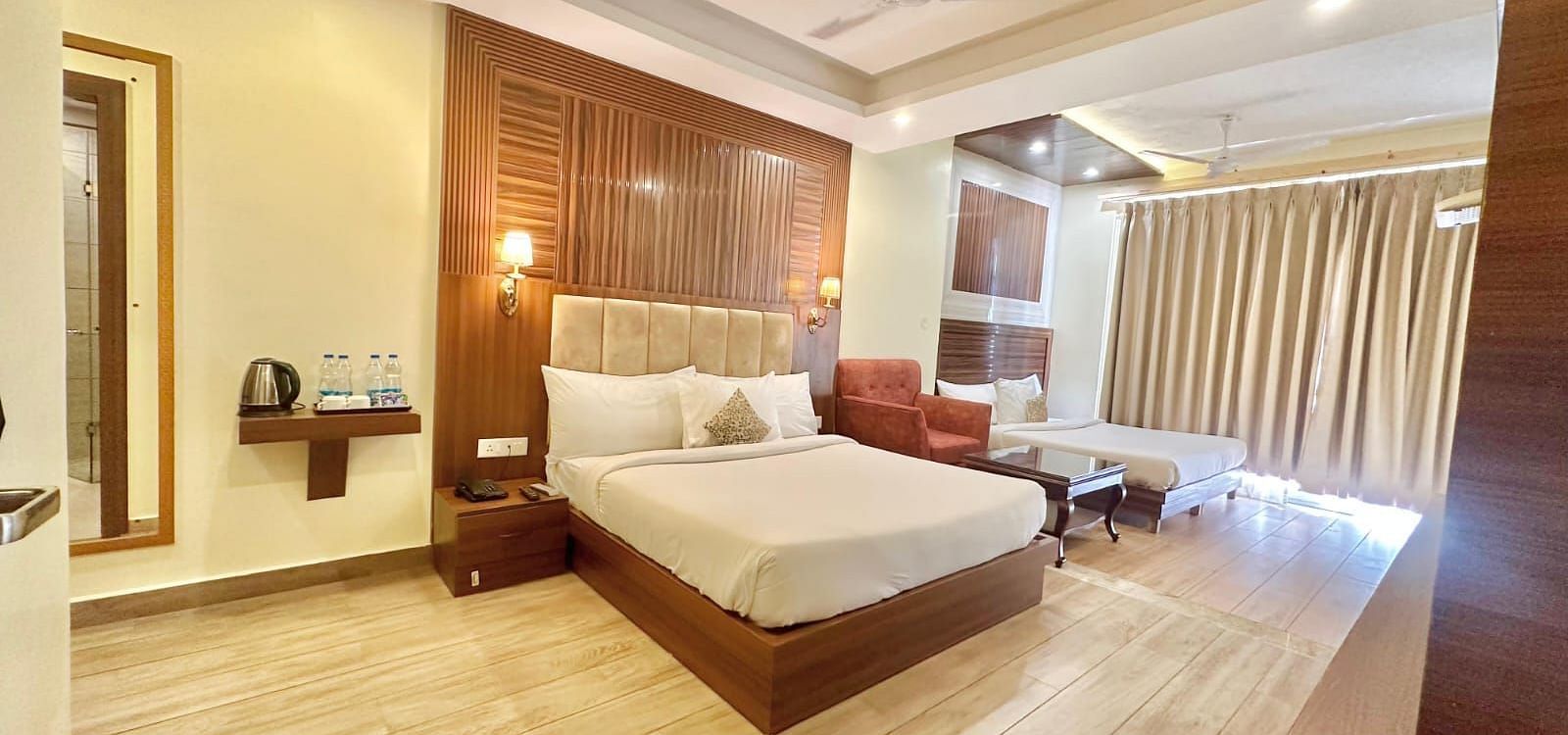 a panoramic image of the family room featuring two comfortable double beds with a false ceiling on the top - ZENQ SIGNATURE INN, MCLEODGANJ