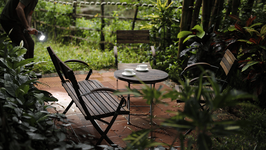 Garden seating after rain at Amanvana Spa Resort in the monsoon