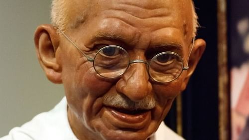 Statue of MK Gandhi holding his stick.