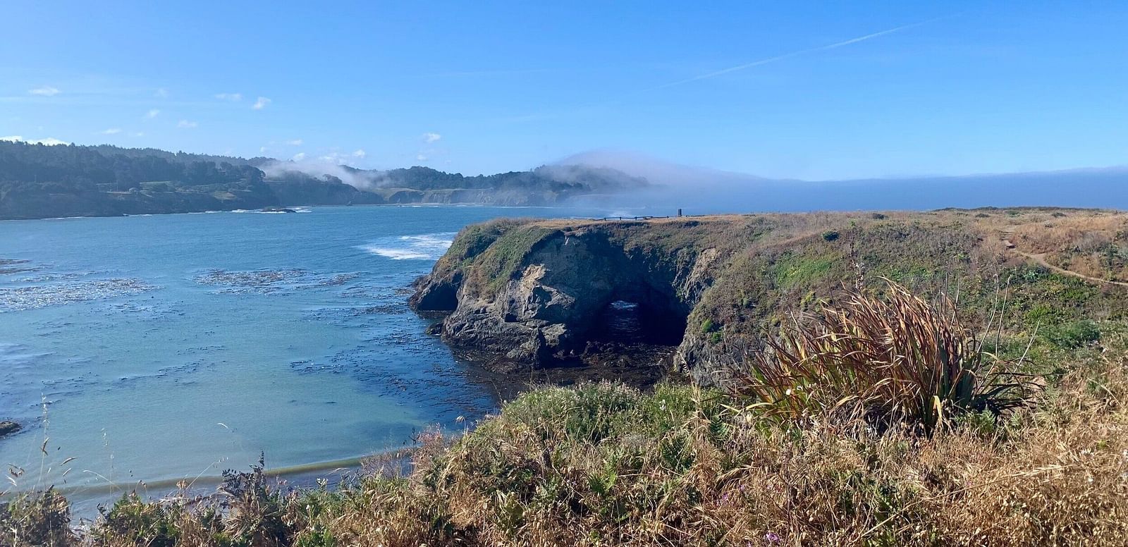 A mountain arch with the view of the ocean