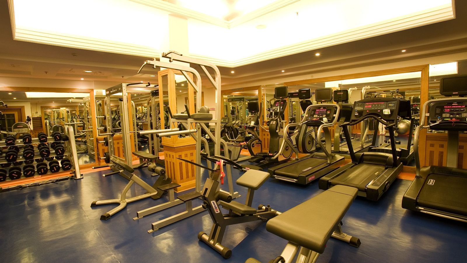 Side view of  well equipped gym at  Grand Chennai By GRT Hotels.