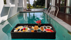 floating breakfast inside a private swimming pool in andaman at Symphony Summer Sand Beach Resort And Spa, Neil Island