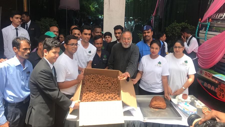 members of the kamat khandan posing with the seedballs sent to orissa