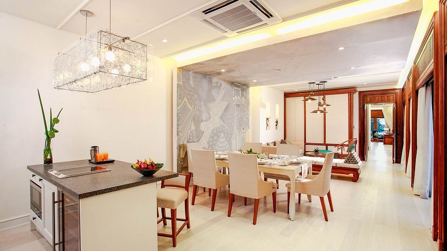 image of an expasive living room with a small kitchenette - one bedroom private pool beachfront villa