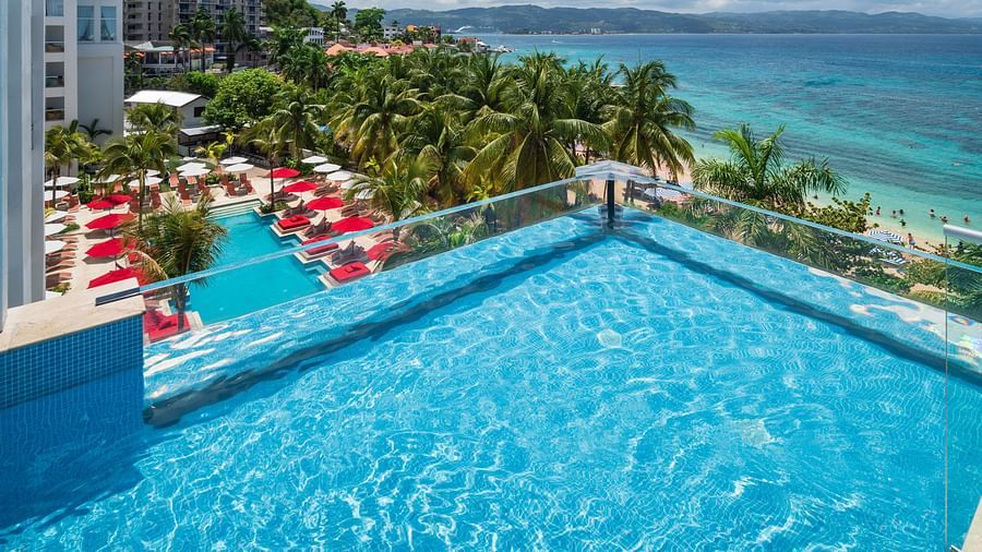 An image of a rooftop pool with views of the beach - S Hotel Montego Bay, Jamaica