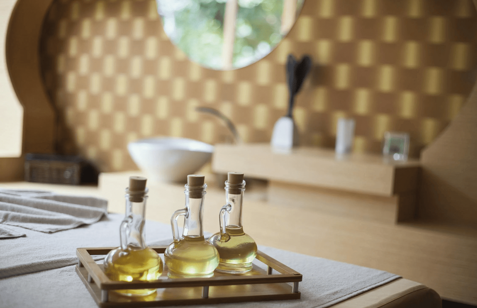 Image of three glass containers filled with liquid.