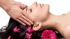 A woman receiving a massage at the spa inside The Retreat Hotel and Convention Centre