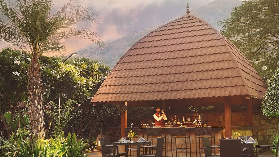A view with our swimming pool and The Palm, our italian restaurant in Pushkar 