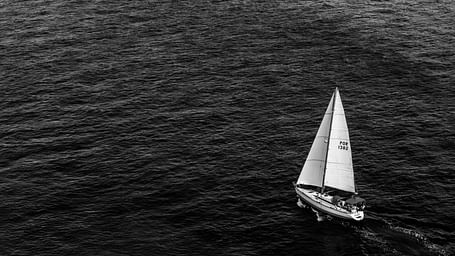 boat sailing in an ocean.