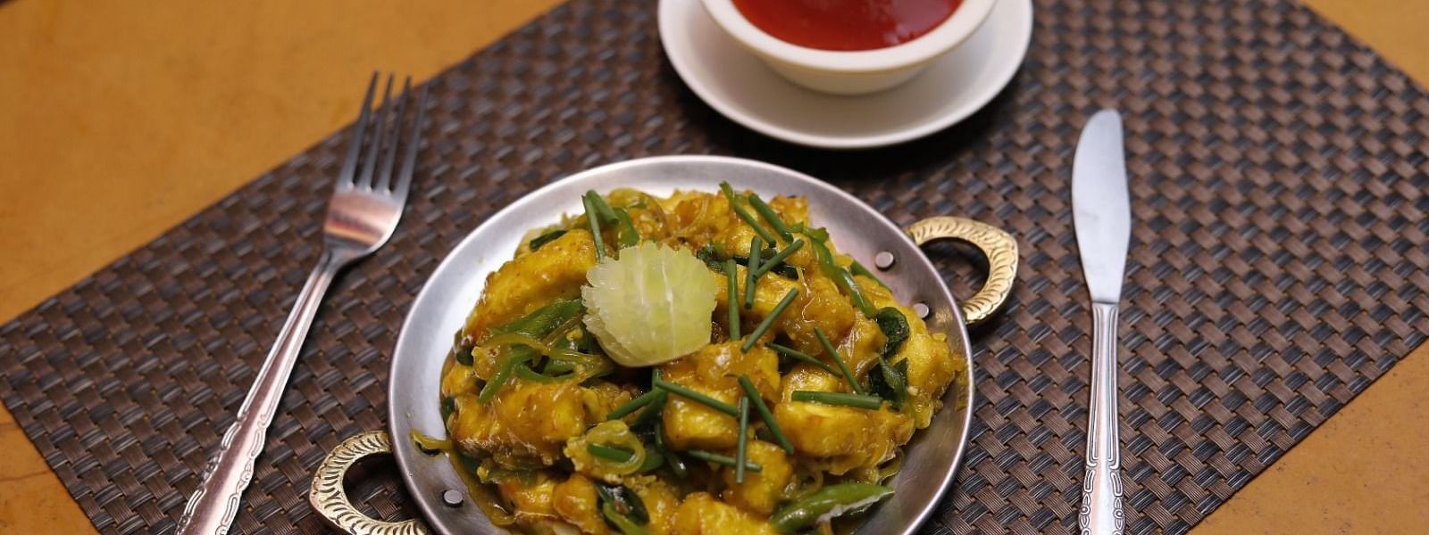 A vegetarian dish on a plate at Hotel Pai Viceroy Jayanagar
